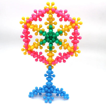 Montessori Schneeflocken Bausteine